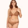 The Busty Bralette - Print: Latte Leopard -KIKIO Underwear Shop 1 on model front busty bralette latte leopard 90c4f2b5 f80a 4a15 a45f a29694cdbe78