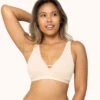 The Eco Deep V Bralette: Toasted Almond -KIKIO Underwear Shop 1 on model front eco deep v bralette toasted almond