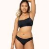 The Eco Straight Up Bralette: Jet Black -KIKIO Underwear Shop 1 on model front eco straight up bralette jet black 6481a623 1898 4e5a a162 a0353a162674