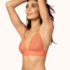 The Long-Lined Lace Bralette: Terracotta -KIKIO Underwear Shop 1 on model front long lined lace bralette terracotta