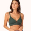 The Stripe Mesh Bralette: Emerald -KIKIO Underwear Shop 1 on model front stripe mesh bralette emerald