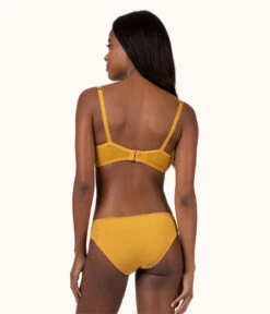 The Unlined Lace Bra: Turmeric -KIKIO Underwear Shop 3 on model back unlined lace bra turmeric