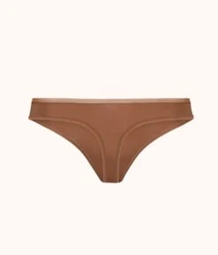 The No Show Thong: Rich Clay 11 The No Show Thong: Rich Clay -KIKIO Underwear Shop product flat back no show thong rich clay 15593b30 12d3 4684 a547 c67210caef38
